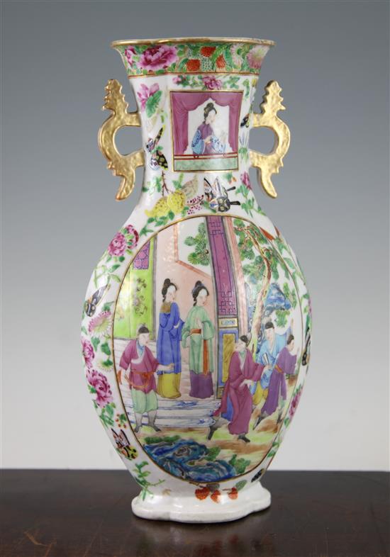 A Chinese Canton-decorated famille rose two handled vase, Jiaqing / Daoguang period, 31.5cm, rim chip